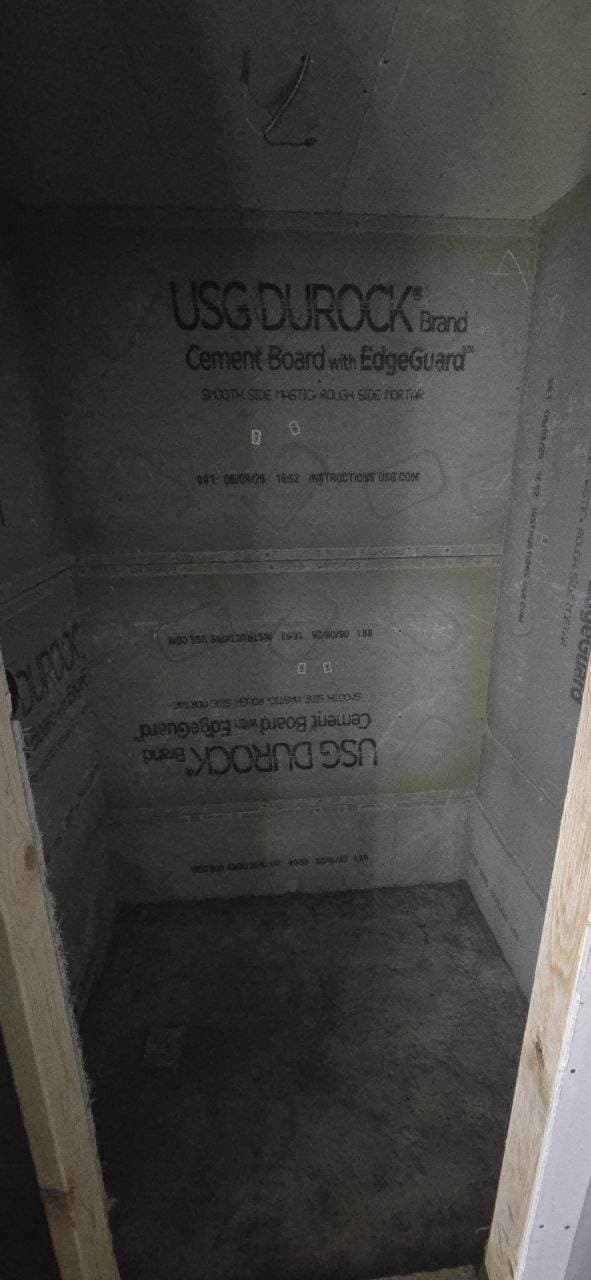 Cement board shower wall prep for bathroom remodeling work by BAX