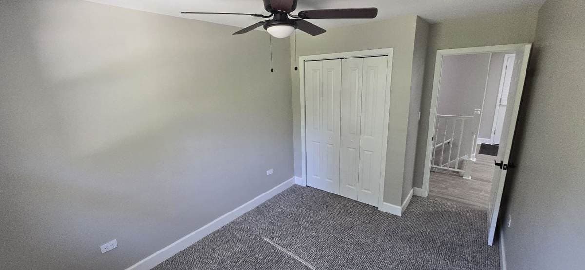 Interior bedroom with newly installed closet doors and trim by BAX in Hoffman Estates