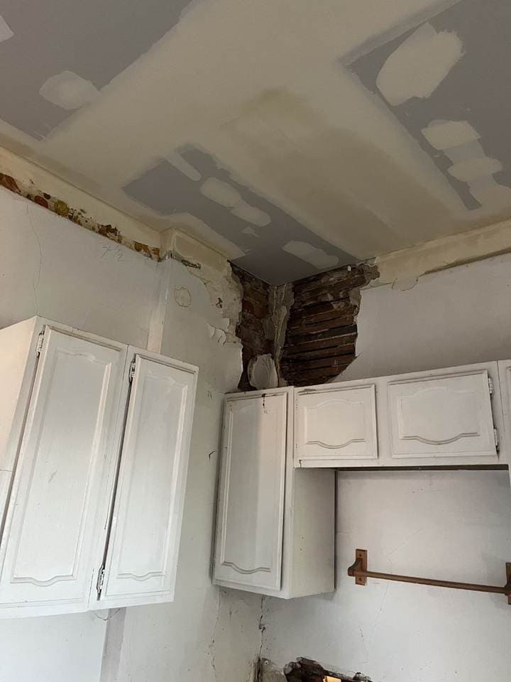 Kitchen ceiling drywall installation and patching work in progress by BAX