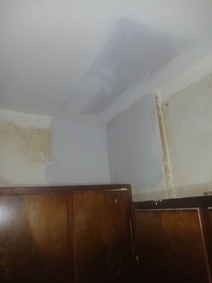 Kitchen corner drywall patch repair above cabinets by BAX