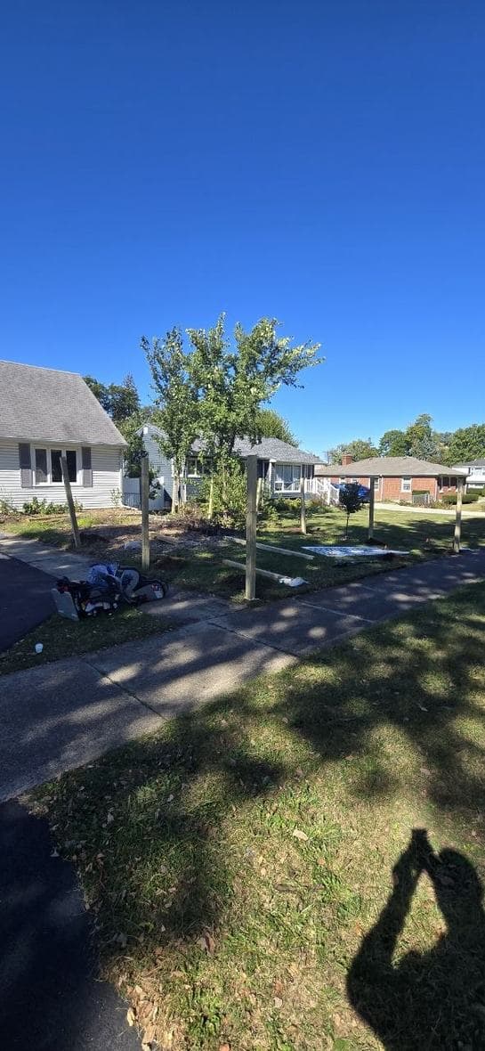 Front yard fence posts installed before vinyl fence panels by BAX