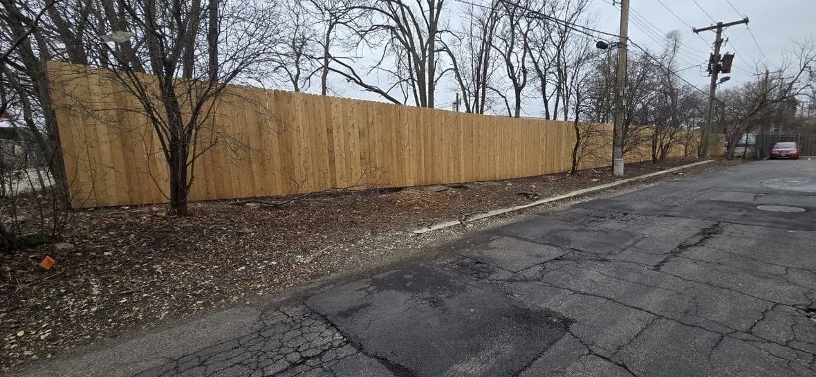 Long wood privacy fence installation completed by BAX near Hoffman Estates